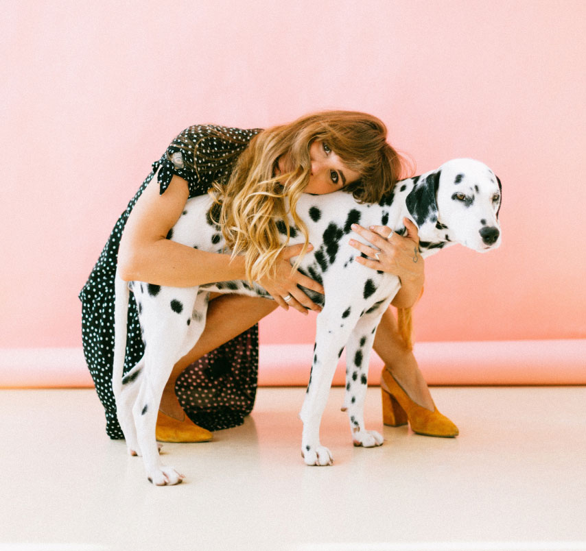 Woman hugging a dog